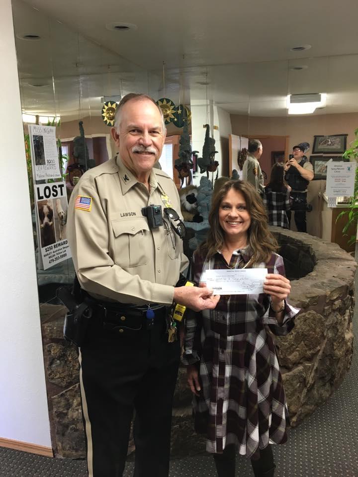 Muldrow Police Give Back To AHIMSA
