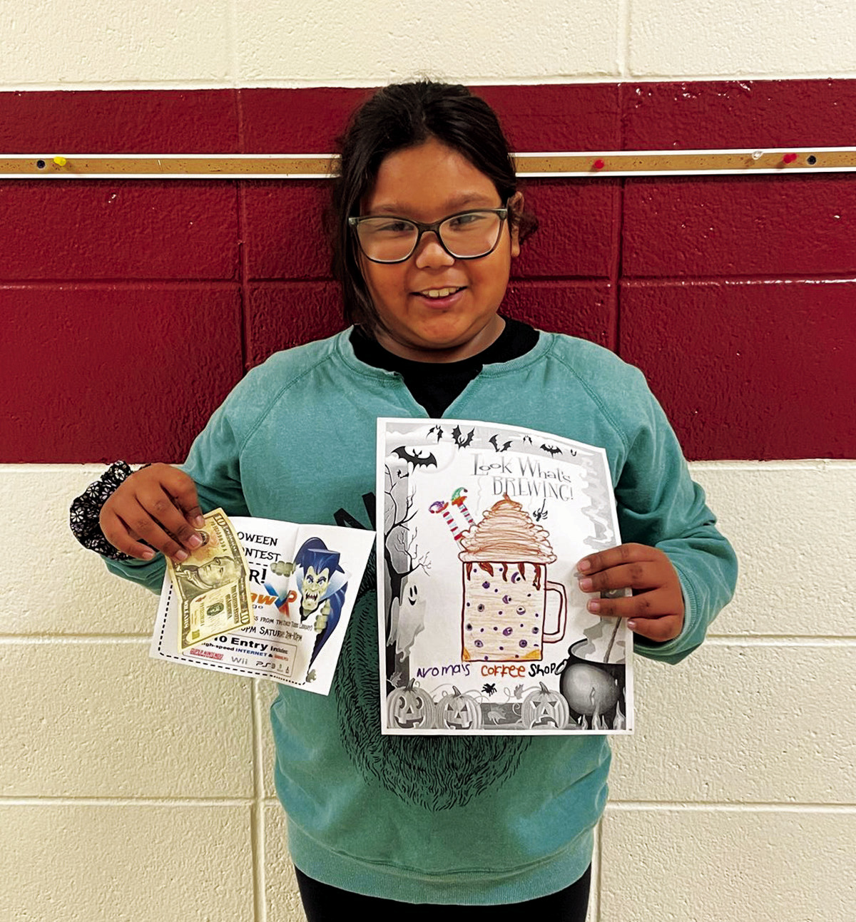 Maya wins art contest eastern times register